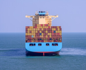 Container ship standing on the anchor.