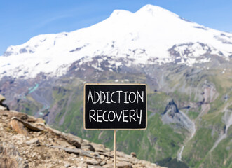Addiction recovery symbol. Concept words Addiction recovery on beautiful black chalk blackboard....