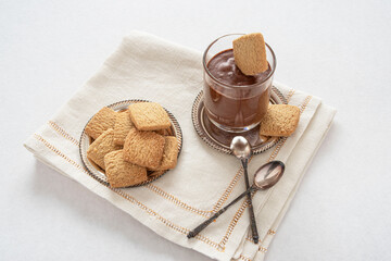 Fototapeta na wymiar Chocolate mousse with biscuits on a table