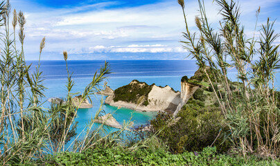 Cape Drastis, the impressive formations of the ground, rocks  and the blue waters panorama, Corfu, Greece, Ionian Islands.