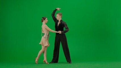 Elegant Ballroom Dance Couple in Action chroma key.