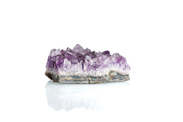 Amethyst mineral stone macro on white background
