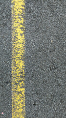 Yellow lines on asphalt