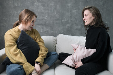 the conversation of two friends, two young women communicate with each other.