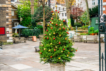 Fototapeta na wymiar Beautiful Christmas Tree outside of St Mary Abchurch in London, England