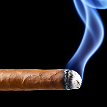Burning Cigar on Black Background