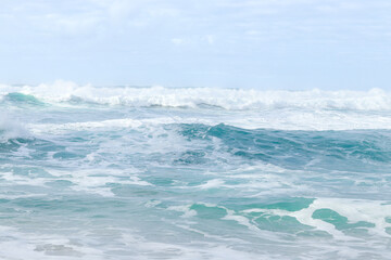 Blue big waves on the Atlantic ocean. The Praia da Ursa beach near Cabo da Roca (Cape Roca). The westernmost point of mainland Europe.