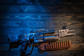 Sci fi post apocalypse pump shotgun and gas mask on the survivor table concept background with copy space. - obrazy, fototapety, plakaty