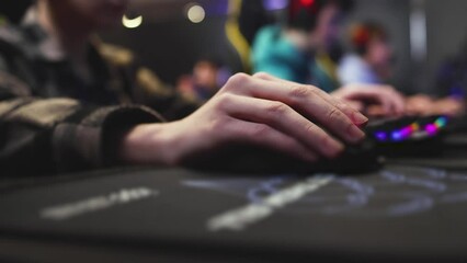 Cyber sport e-sports tournament, team of professional gamers, hands on a mouse and keyboard, gamers playing online championship in competitive moba, strategy fps game in a cyber games arena club