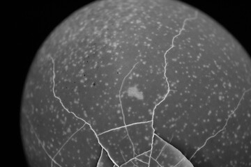 a cracked egg lit from below, giving atmosphere © Gosia.wuuu