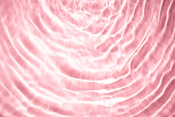 Beautiful water texture with waves. pink color, water background