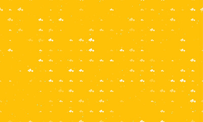 Seamless background pattern of evenly spaced white road roller symbols of different sizes and opacity. Vector illustration on amber background with stars