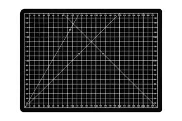 A black cutting mat with a white grid is isolated on transparent background.