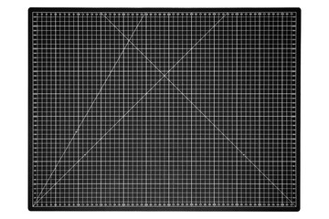 A black cutting mat with a white grid is isolated on transparent background.