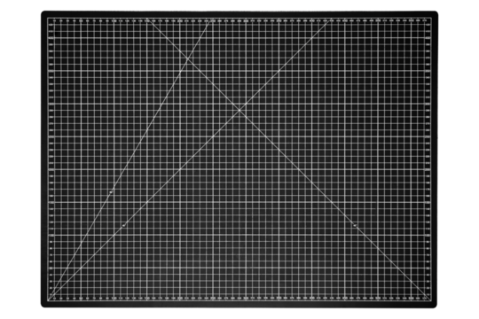 A black cutting mat with a white grid is isolated on transparent background.