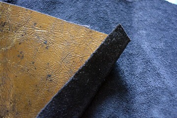 Beautiful materials, leather goods, a natural thick piece of leather with a golden sheen, shimmer...