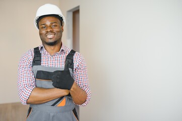 portrait of an African American construction worker on location