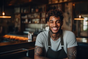 Obraz premium Portrait of a smiling bartender at the bar