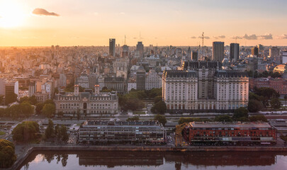 Aerial view on modern city at sunset