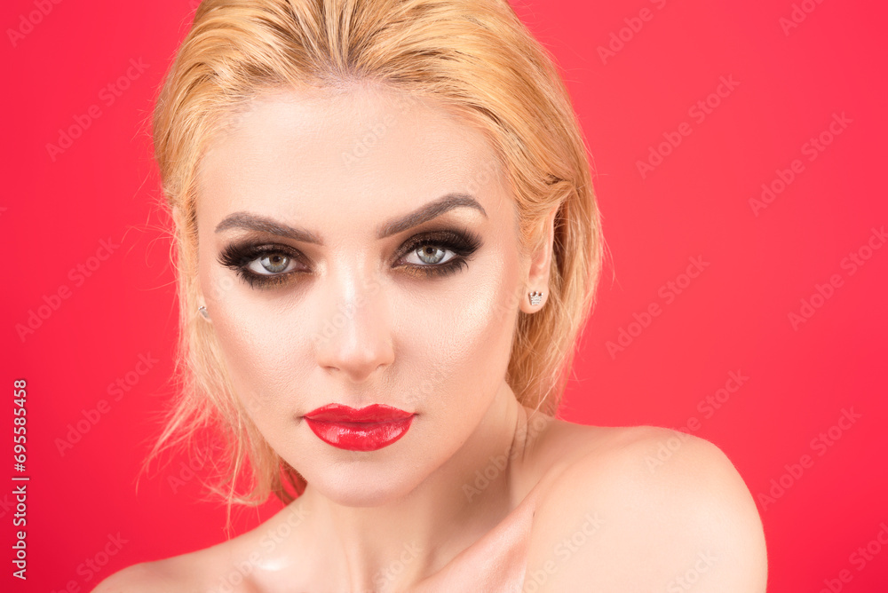 Wall mural beauty woman with fashion eyes make up, red lipstick on plump lips, close up face. beauty skin. woma