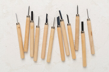 Carpenter tools on concrete background,top view
