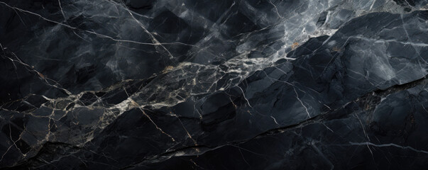 Black marble texture background, abstract pattern of light lines in dark rock. Wide banner of stone...