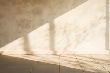 Shadow on a natural-colored wall from a window, sun rays and shadow of window curtains on wall