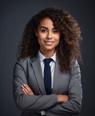 A smiling woman in a suit and tie Generative AI