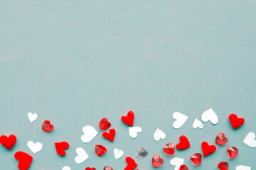 Valentines Day background. Handmade hearts on blue background. Flat lay, top view, copy space