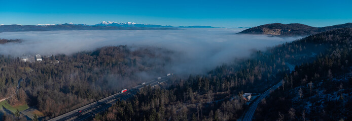 Thivk layer of morning fog over Ljubljana basin, viewed from Verd or upper part of Vrhnia. Looking towards the city