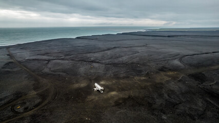dakota plane wreck on black beach in iceland