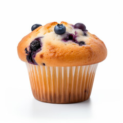 Fresh blueberry muffin with visible berries, isolated on white background.