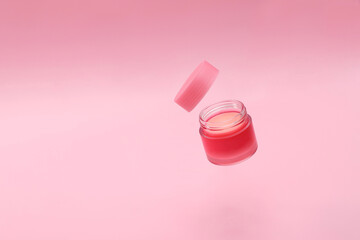 Lip balm jar, pink cream in container