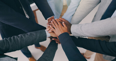 Hands together, closeup or business people with teamwork, support or solidarity. Team building, huddle or worker group with motivation, partnership or trust, training or goal agreement celebration