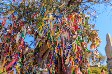 Colored ribbons for good luck, popular customs and superstitions. Background with selective focus and copy space