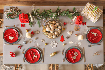 Dining table with festive setting for Christmas celebration
