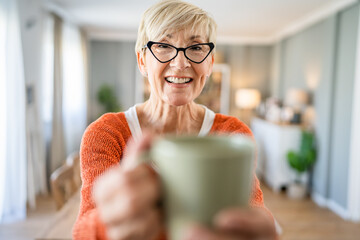 Close up portrait of one senior woman with short hair happy smile