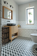 Modern bathroom with pattern tiles on the floor and white tiles on the wall. Design interior with bath, toilet, wooden cabinet with ceramic sink.