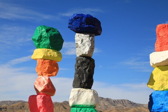 Seven Magic Mountains, the neon totems each weighing 10 to 25 tons, arranged in seven towers about 30 feet tall. Each stone painted a bright, fluorescent color. Las Vegas, Nevada, USA - December 13
