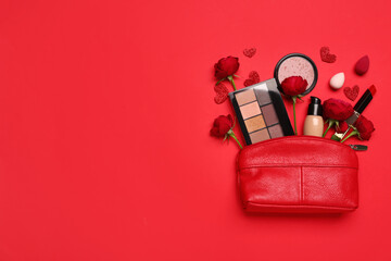 Cosmetic bag with make up products and roses on red background. Valentine's day celebration