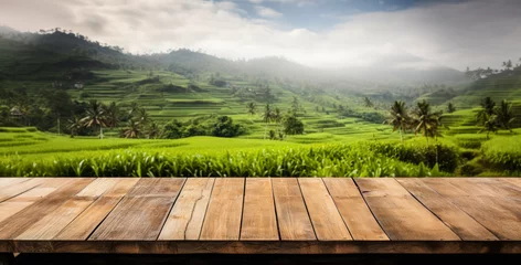 Tuinposter Empty rustic old wooden boards table copy space with terraced rice field in background. Product display template. Generative AI © Lubo Ivanko