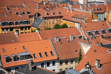 Aerial view of red roofs of traditional houses in the city center of Copenhagen in Denmark