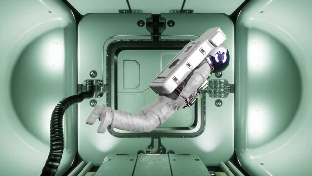 Astronauta flotando debido a la gravedad cero, en su nave espacial va cruzando las puertas que se abren hasta salir al espacio.