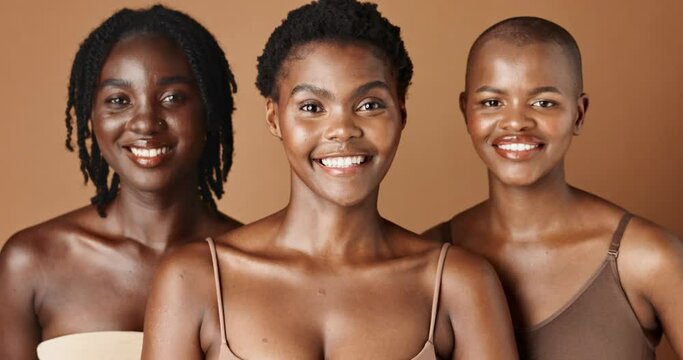 Happy, face or natural models with beauty, glowing skin or afro isolated on brown background. Facial dermatology, black women or skincare cosmetics in studio with girl friends or proud African people