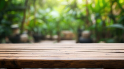 Empty Old Bamboo Table with Blurred Garden Theme in Background, Perfect for Product Display.