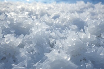 Fototapeta na wymiar Crystalline texture of freshly fallen snow under sunlight