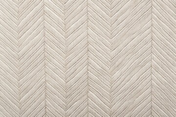 Texture of a classic herringbone fabric in neutral tones