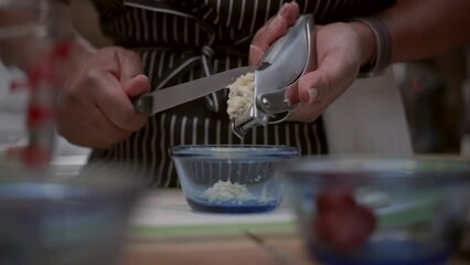 A Culinary Symphony with Garlic, a Black Woman’s Touch, and a Blue Bowl