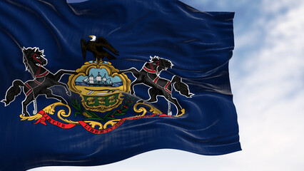 Close-up of Pennsylvania state flag waving on a clear day