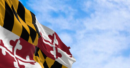 Maryland state flag waving on a clear day - obrazy, fototapety, plakaty